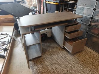 Computer desk with laptop mount
