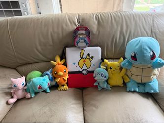 Pokémon cards and plushies