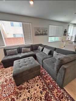 6-Piece Dark Gray Sectional Sofa Set w/ Storage Ottoman – $750