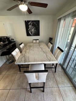 Real marble table with 6 chairs used as new in 1500