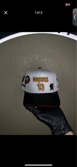 JC hats Luis R