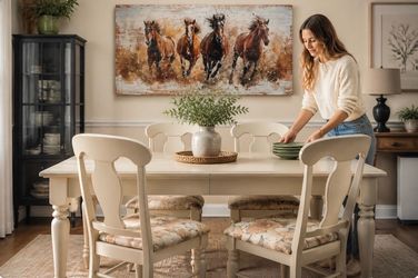 Elegant dining table with four matching floral cushion seats