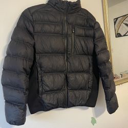 a Michael Kors Women Puff  jacket 