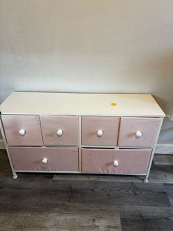 Pink fabric dresser