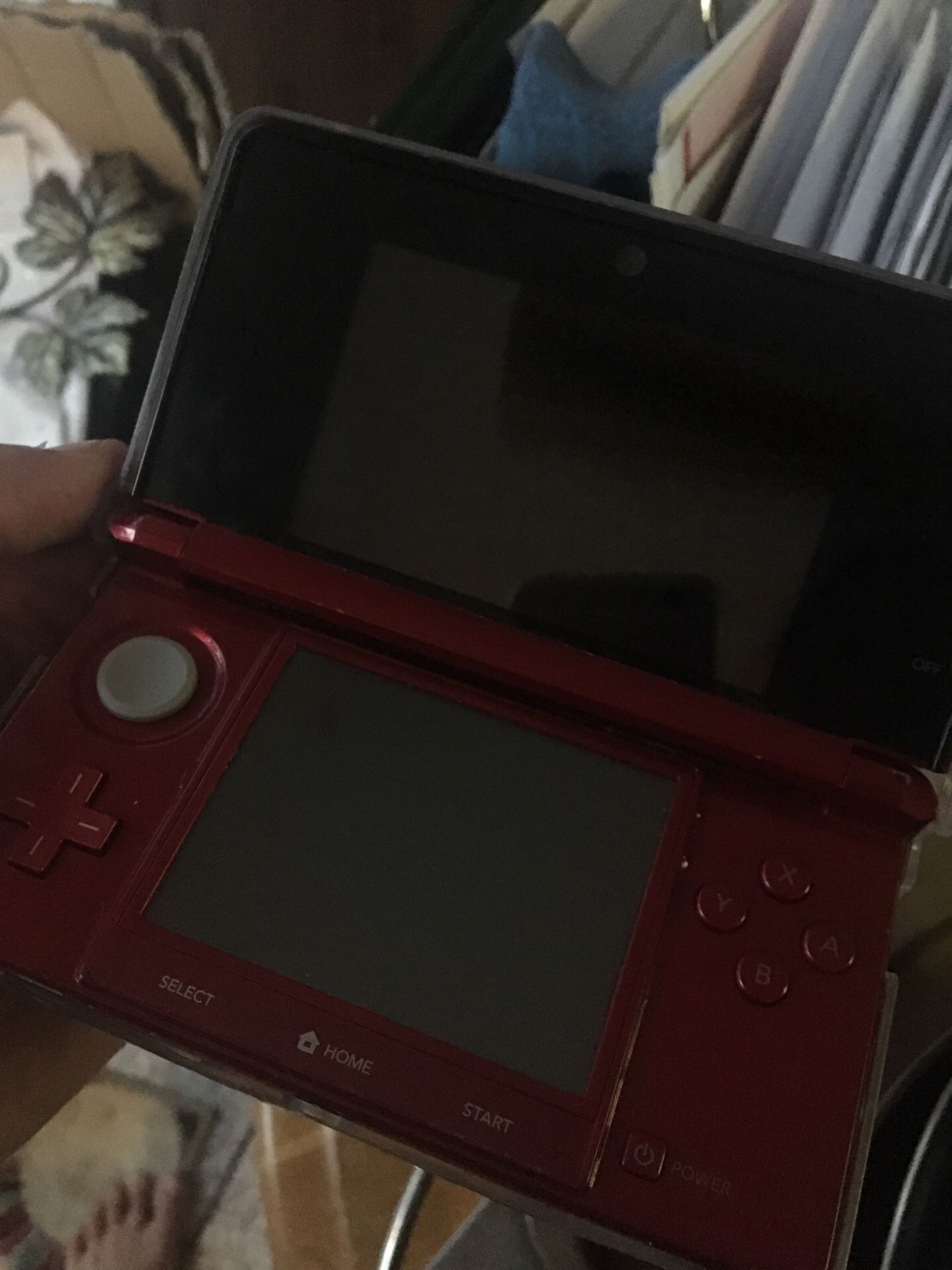 Red Nintendo 3DS w/ removable flash case