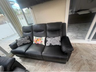Two three seat reclining sofas