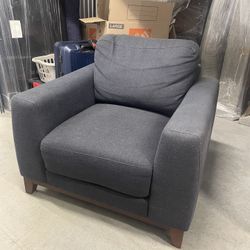 Navy Blue Fabric Armchair with Dark Wood Legs – Good Condition
