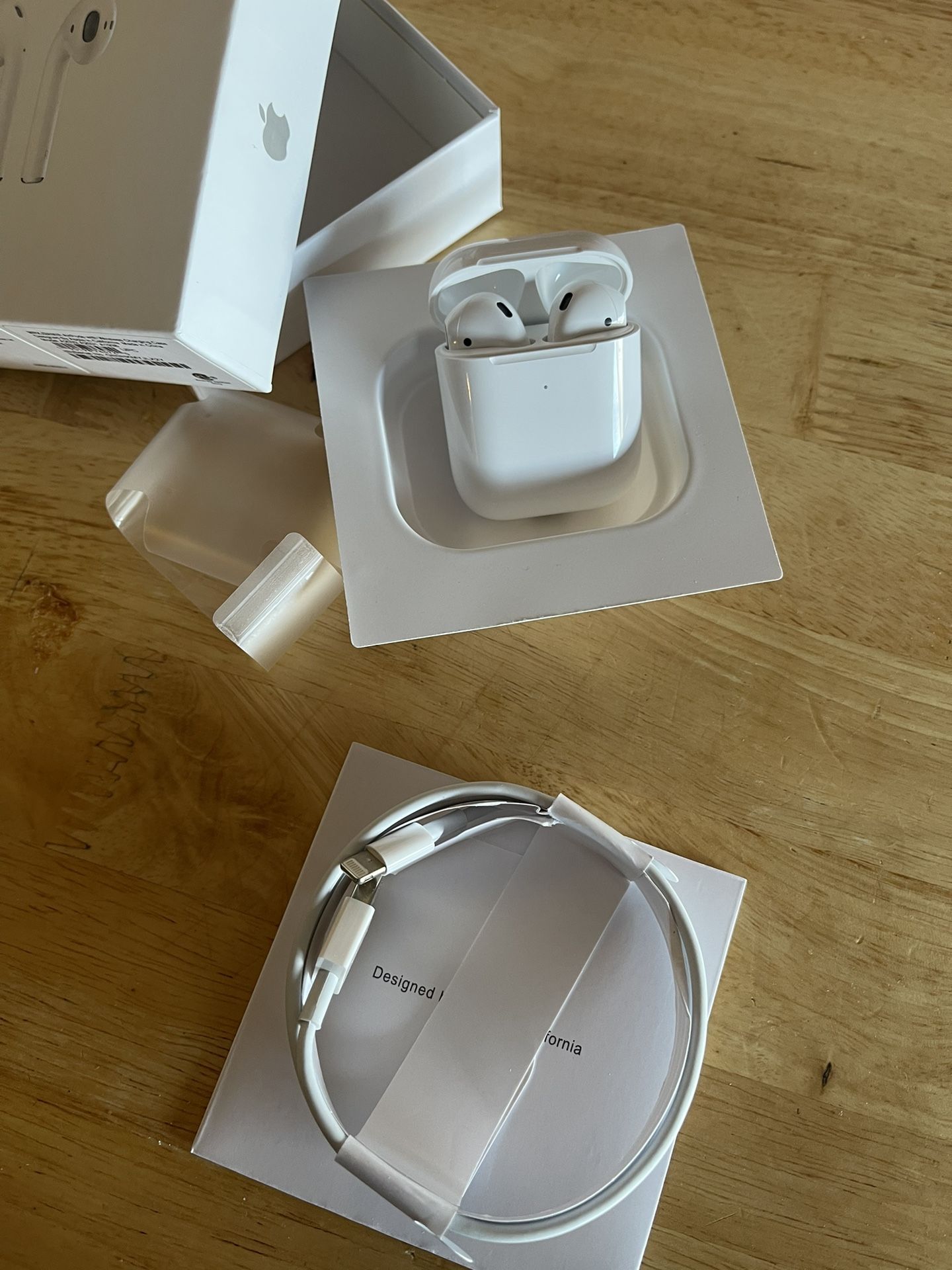 Apple AirPods True Wireless Bluetooth Headphones (2nd Generation) with Charging Case