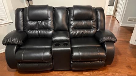 Black Leather reclining couch angle loveseat
