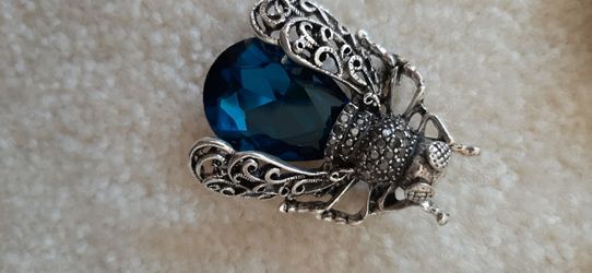 Silver tone Insect Brooch with a blue gem