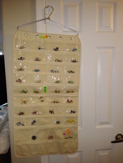 Various jewelry pieces and jewelry holder