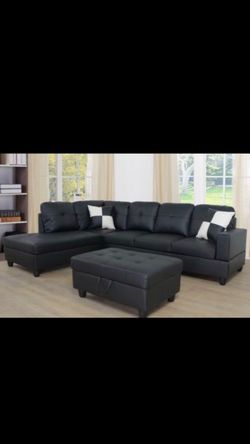Brand new black leather sectional sofa with storage ottoman