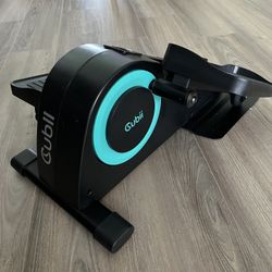 Cubii under desk, elliptical machine