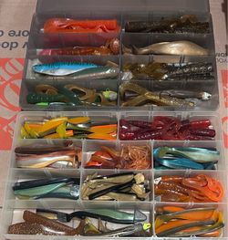 Large Assortment of Soft Plastic Fishing Lures 5 large Plano Boxes and one fabric storage bag