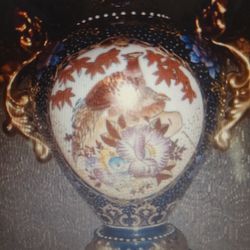 ASIAN MULTI COLORED PORCELAIN VASE WITH HANDLES AND GOLDEN PHOENIX 