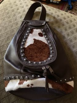 Leather and cowhide backpack /purse