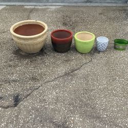 4 Ceramic Planters and 1 Small Metal One.