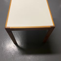 Wooden table with white top