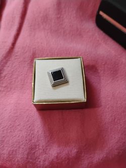 Black tie pin in box