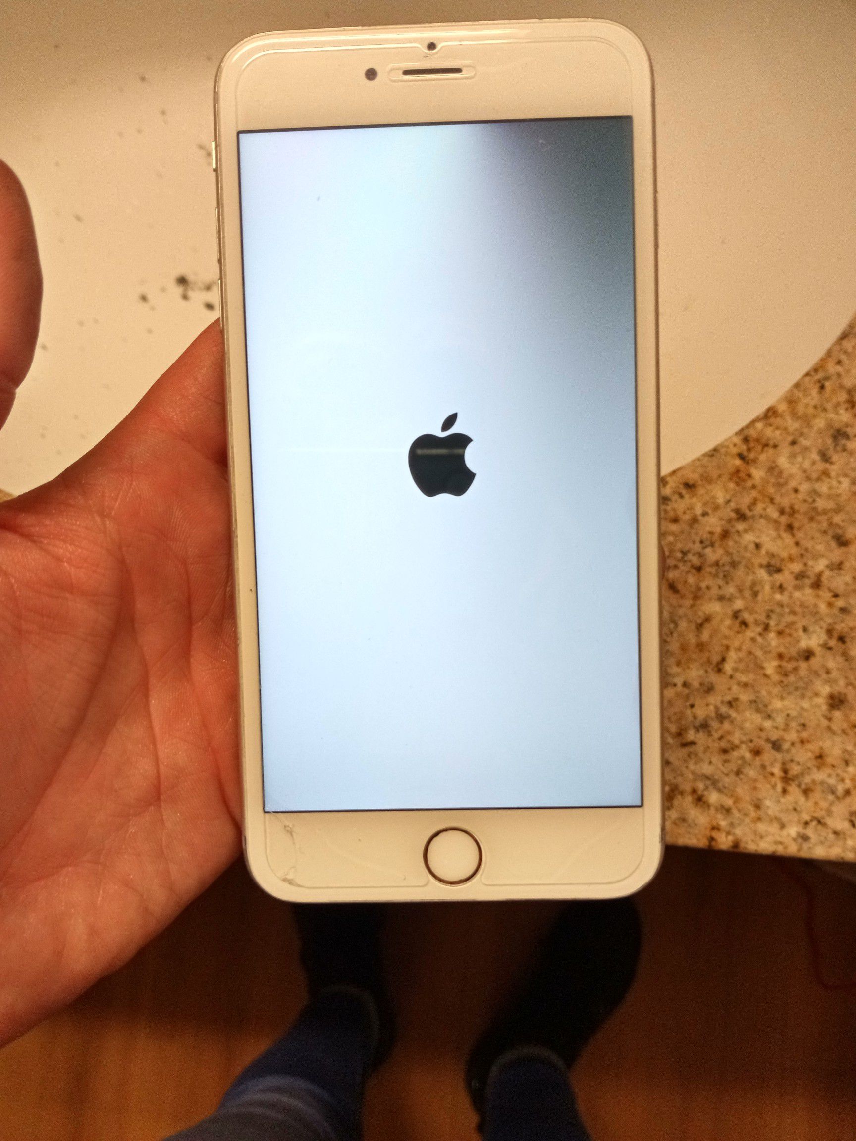 Iphone 6s pro with screen protector and 2nd generation apple air buds