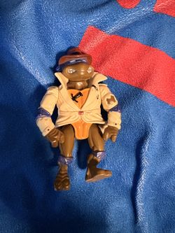 Teenage Mutant Ninja Turtles Donatello disguise figure 1990