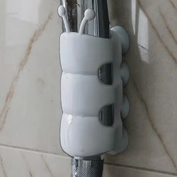 $4.   No-Drill Shower Head Holder | Adjustable Wall Mount with Suction Cups