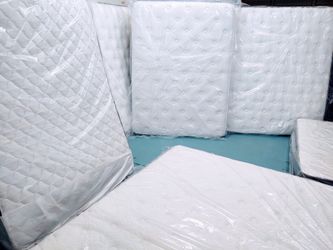 Brand New Mattresses in the Factory Plastic