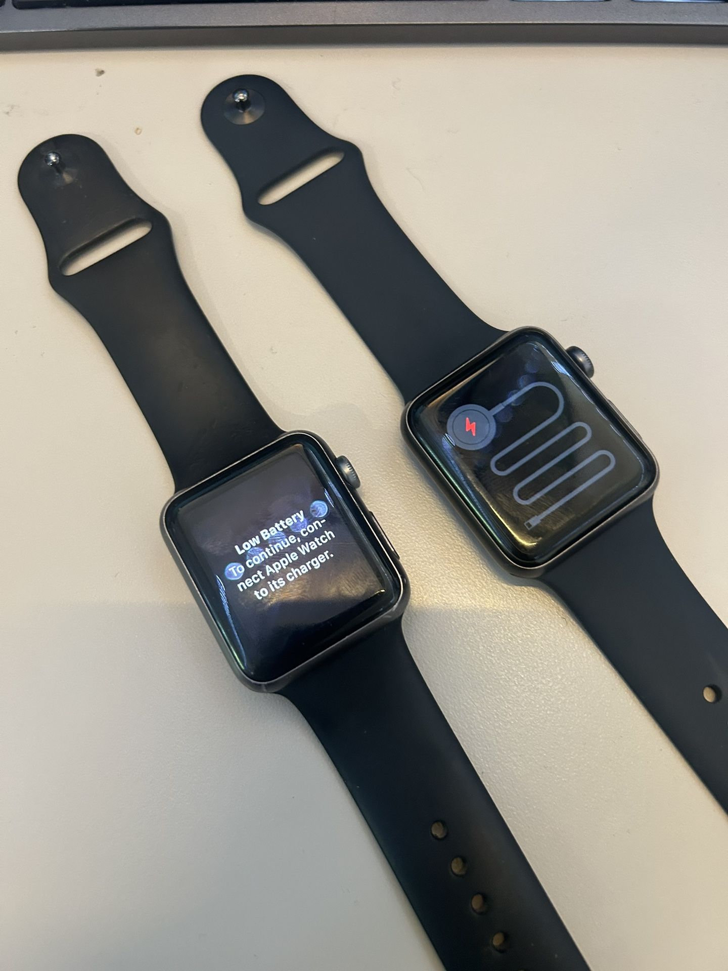 Two 42mm Apple Watches – 7000 Series & Series 3 (As-Is for Parts)