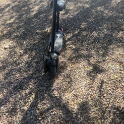 off-road electric scooter with a removable seat, similar to models like the FREEBOY J15MAX Electric Scooter or the FREEBOY J01 Electric Scooter.