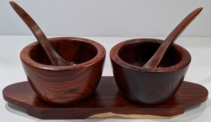 Wooden bowls with spoons and base