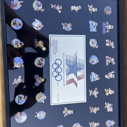 Two sets of 1984 Olympic Games Pins