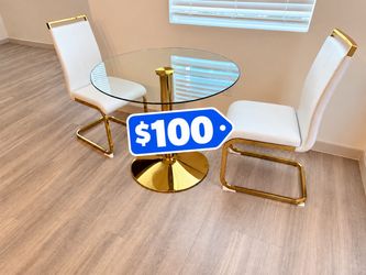 Glass and gold gold two-piece dinette set