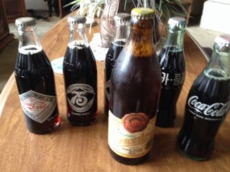 Old coke soda bottles- 75.00 for all