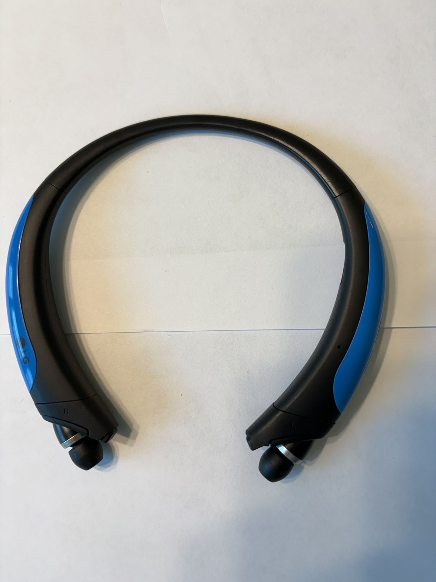 LG Tone Active HBS-850 Bluetooth Headset in blue. With Case