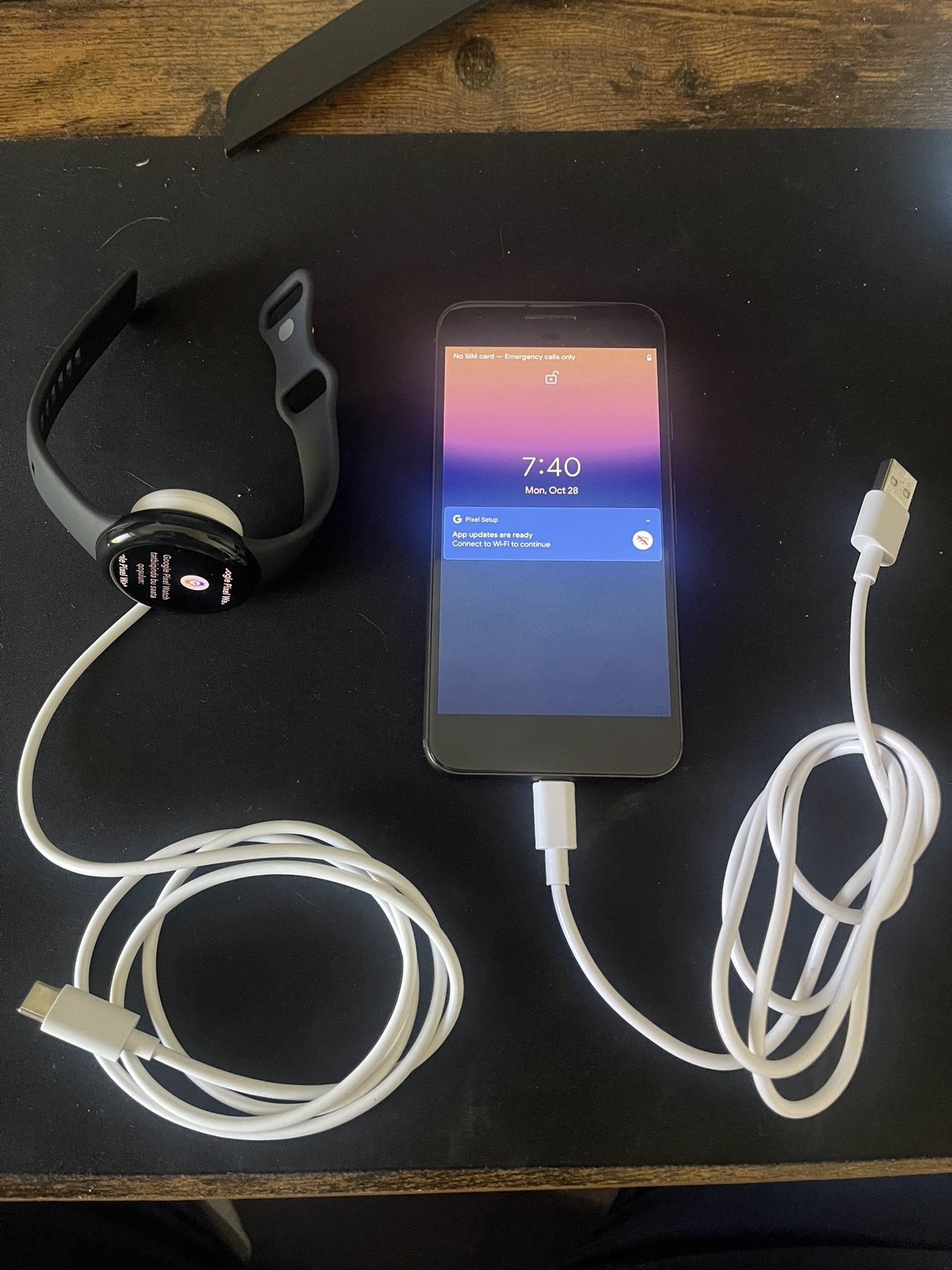 Google Pixel 1 and Google Pixel Watch 2