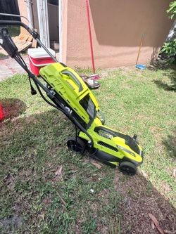Eléctric lawn mower , corta césped eléctrico