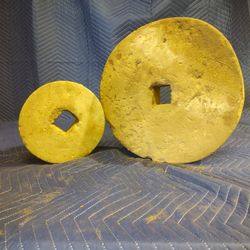 2 Antique Milling Stones