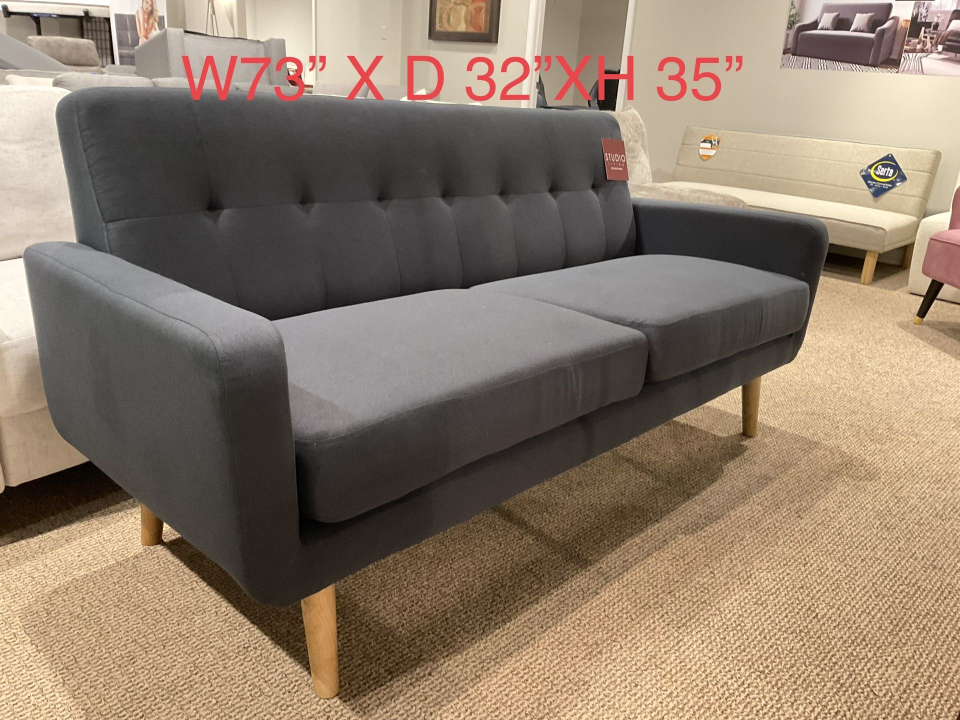 New sleeper sofa futon by Serta floor sample
