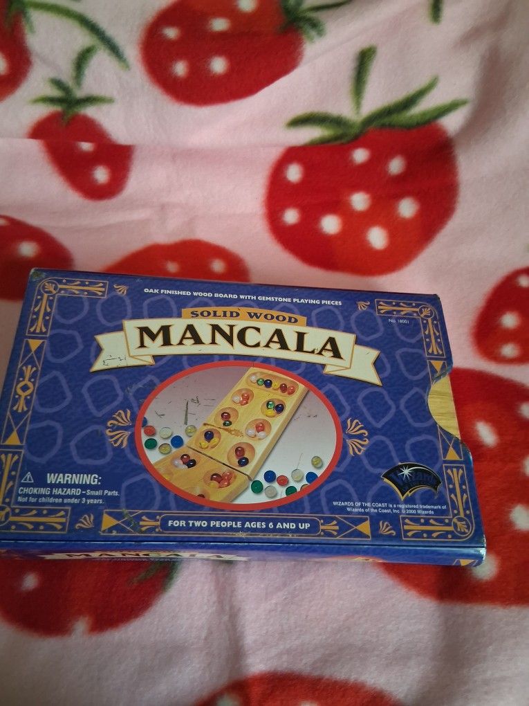 Antique board game Mangala