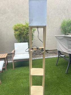 Tall wooded floor lamp with Shelves and Outlets