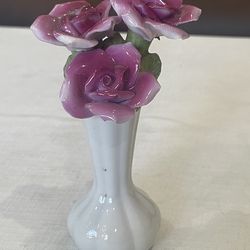Vintage porcelain figurine of three pink roses in a white vase. Made in Japan
