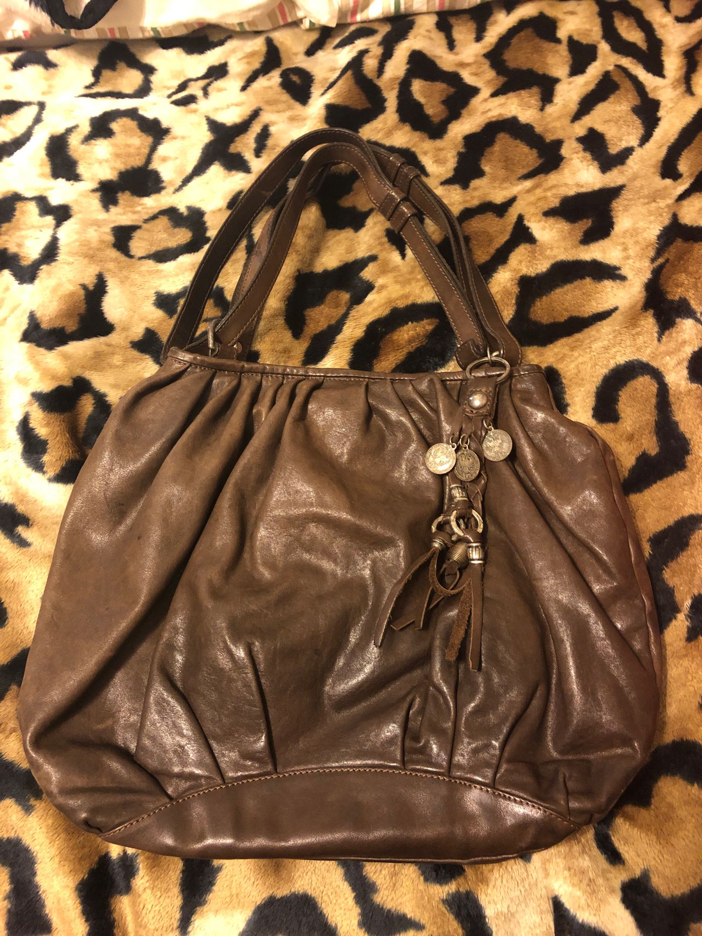 Designer Italian leather hobo handbag with dust bag.