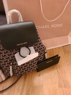 Michael kors BRAND NEW wallet and backpack!!!!