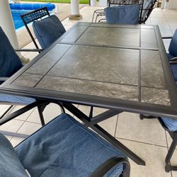 Outdoor Table With 6 Denim Cushioned Chairs 