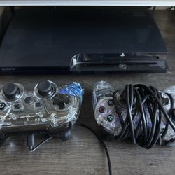 PS3 with Controllers and Games