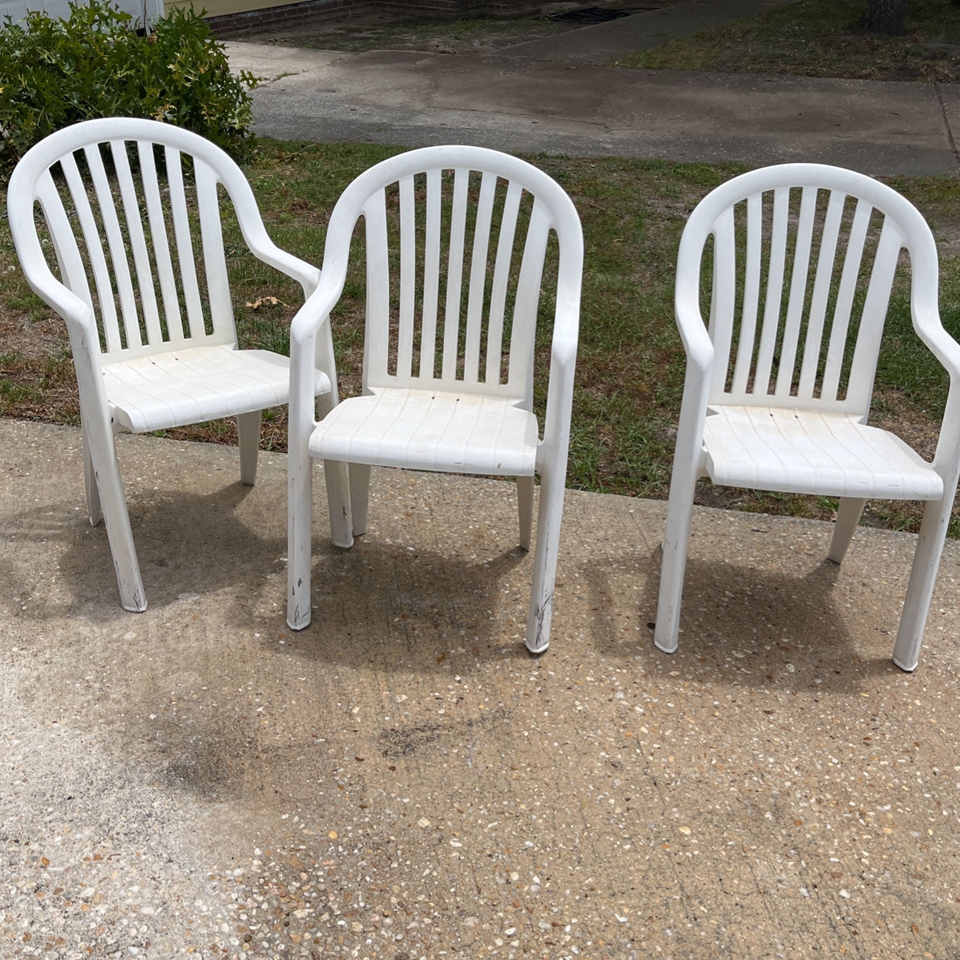 Plastic Chairs Three Of Them Outside Chairs