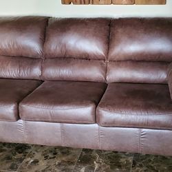 Leather Couch With Pull Out Bed. Brand New. Never Slept On.