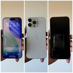 Apple iPhone 16 Pro Max 256GB White Titanium in good condition for sale. Works on AT&T, AT&T Prepaid & Cricket Wireless. 