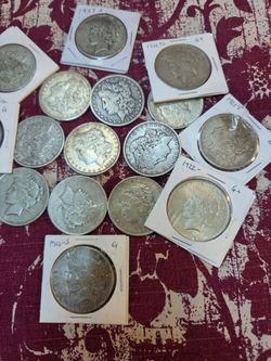 Silver dollars $62.50 Each
