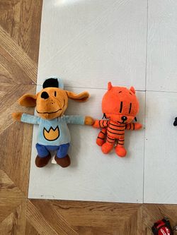 Dog man doll  9 in and lill petey plush 7 in .
